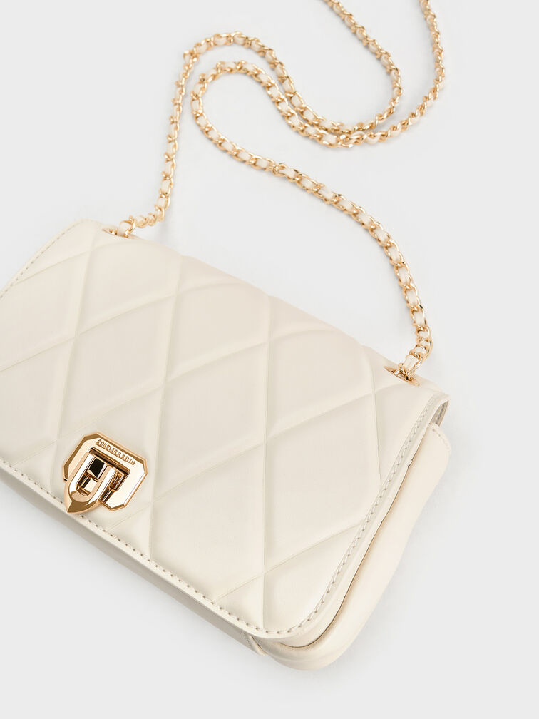 حقيبة كتف أروين بتصميم ماسي فاخر وحمالة أنيقة مضفّرة, كريمي, hi-res